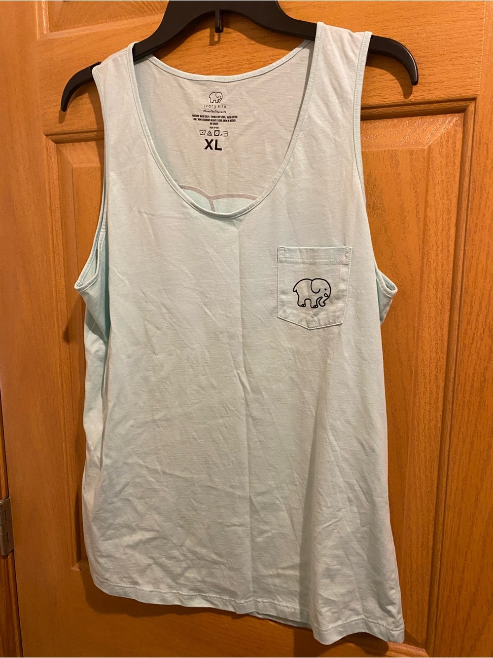 ivory ella mint green pocket tank with elephant logo